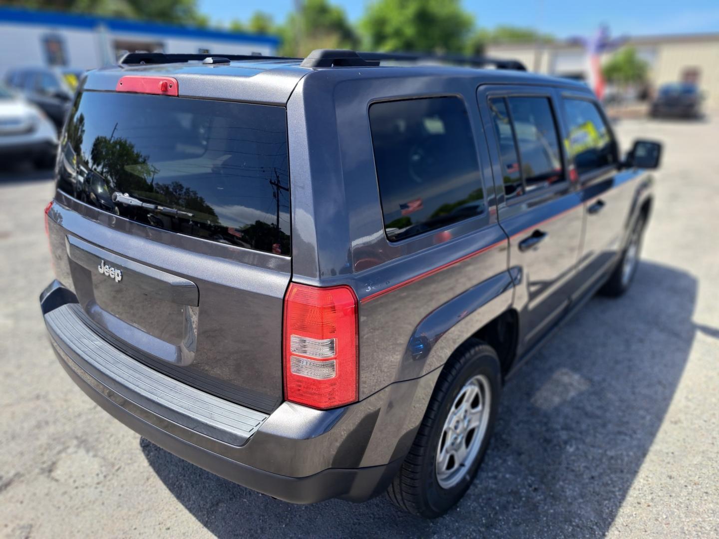 2015 Grey Jeep Patriot (1C4NJPBB9FD) , AUTOMATIC transmission, located at 1181 Aurora Rd, Melbourne, FL, 32935, (321) 241-1100, 28.132914, -80.639175 - Photo#2